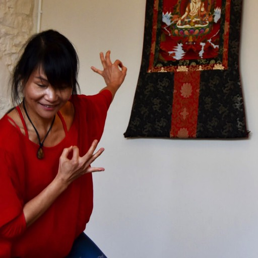 A teacher leading a flow yoga workshop at Yoga Torquay